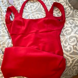 red dress fitted waist line and halter and shoulder straps